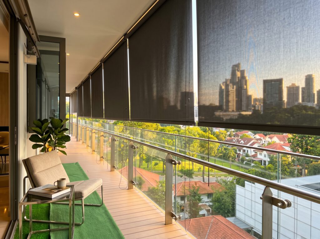 Outdoor blinds installed at a Singapore condo balcony for privacy, glare reduction and comfort.