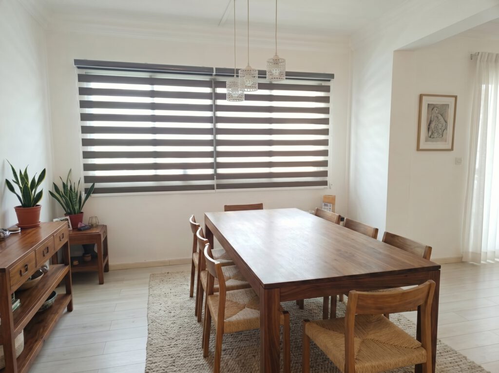 Dimout Korean blinds Singapore installation in a luxury condominium dining room for enhanced privacy and light control.