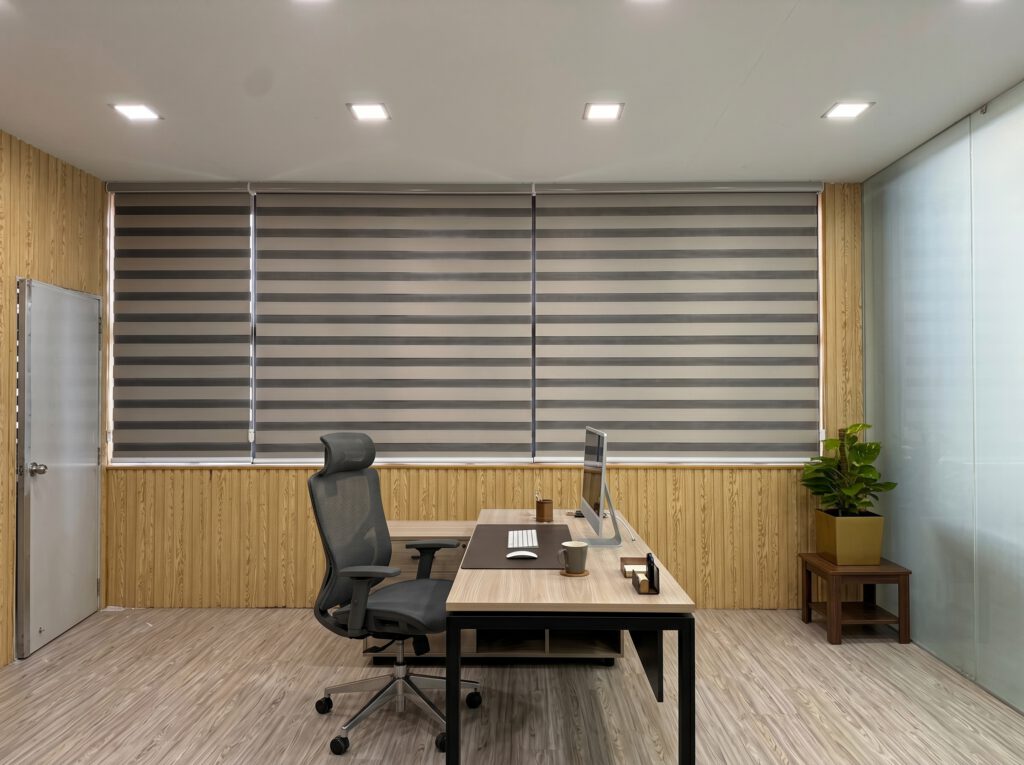 Commercial Korean blinds installation in Jurong East office space featuring modern shadow blinds and glare control.