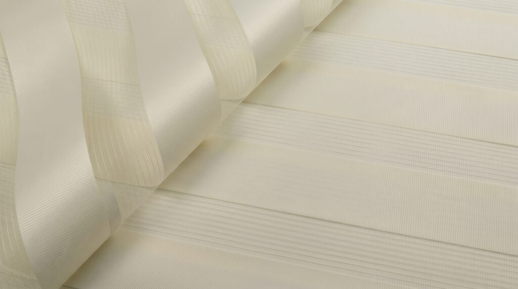 Close-up of premium Korean blinds fabric showing double layer zebra blind material for light control in Singapore homes.