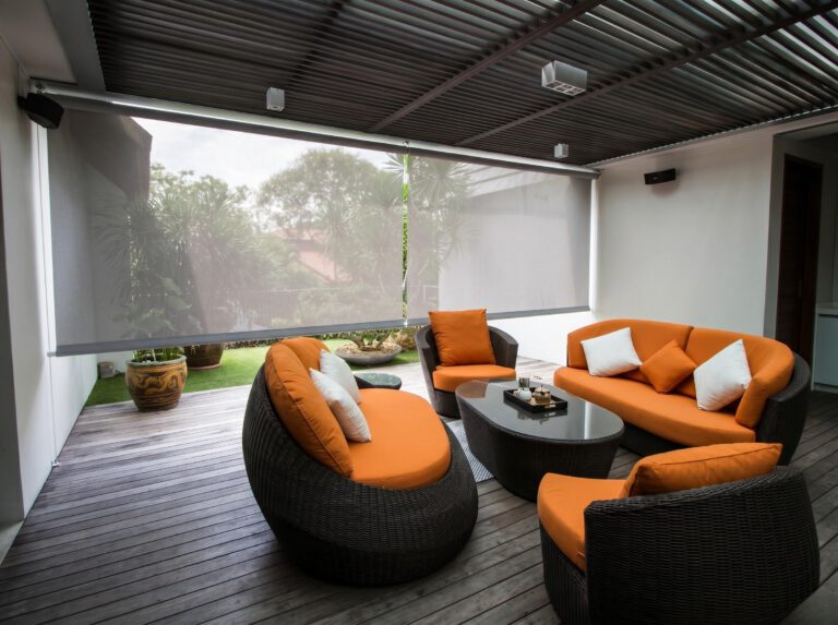 Outdoor sunscreen roller blind shading an HDB balcony in Singapore