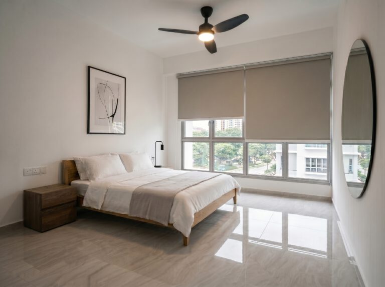Blackout roller blinds in a Singapore bedroom for total darkness and better sleep
