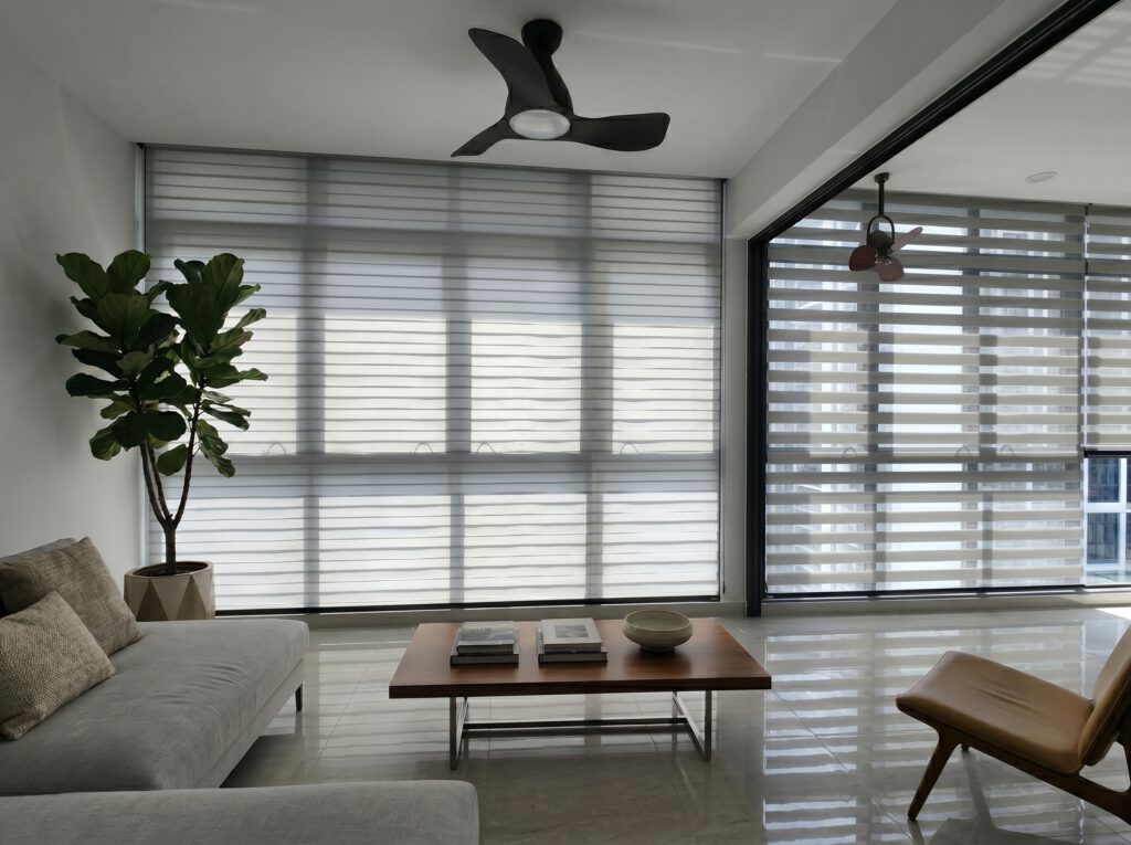 Shadow blinds Singapore installation in a Punggol HDB living room offering privacy, daylight control and contemporary design.