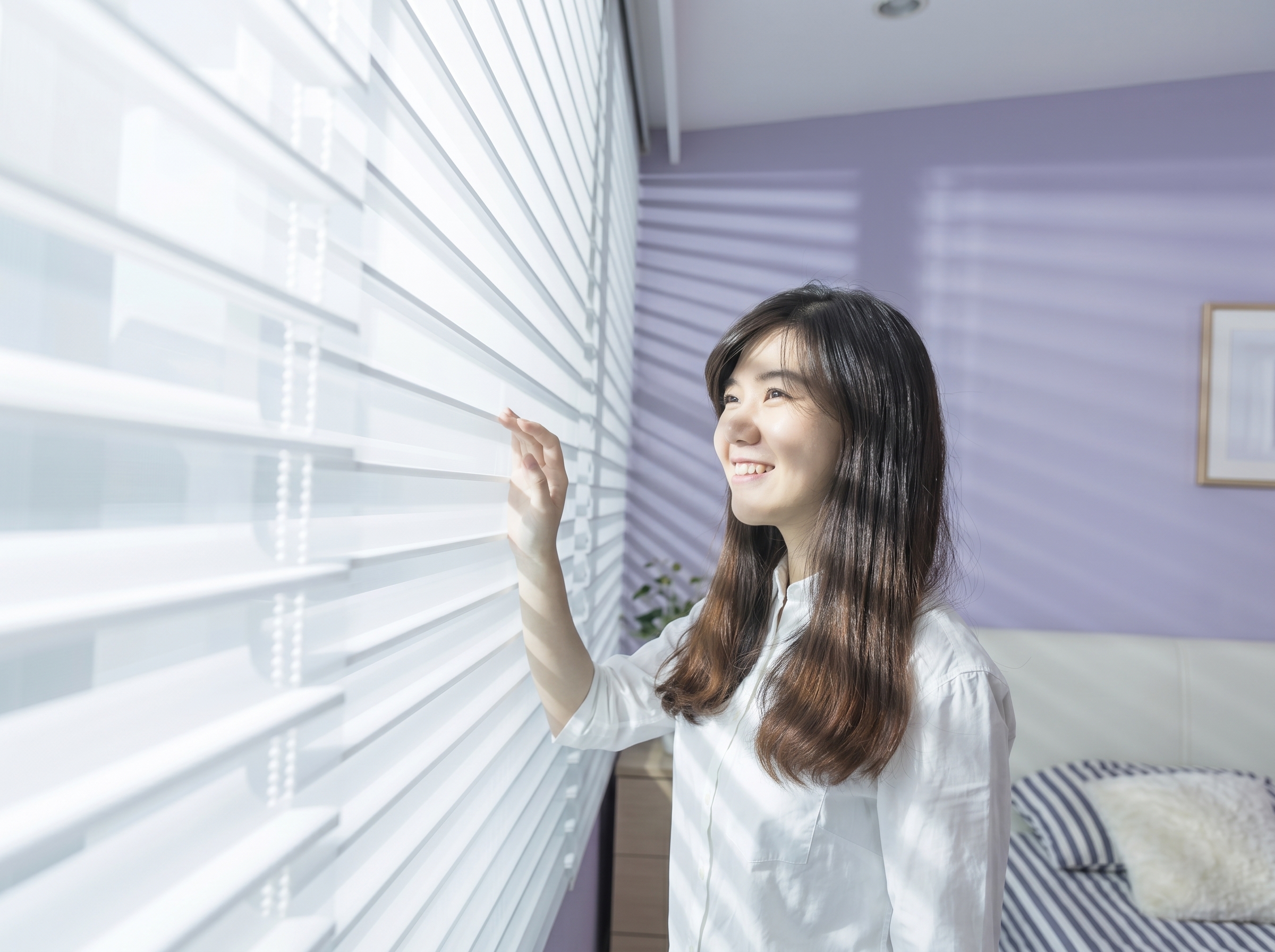 Shangri-La blinds fully open allowing maximum natural daylight into a Singapore home.
