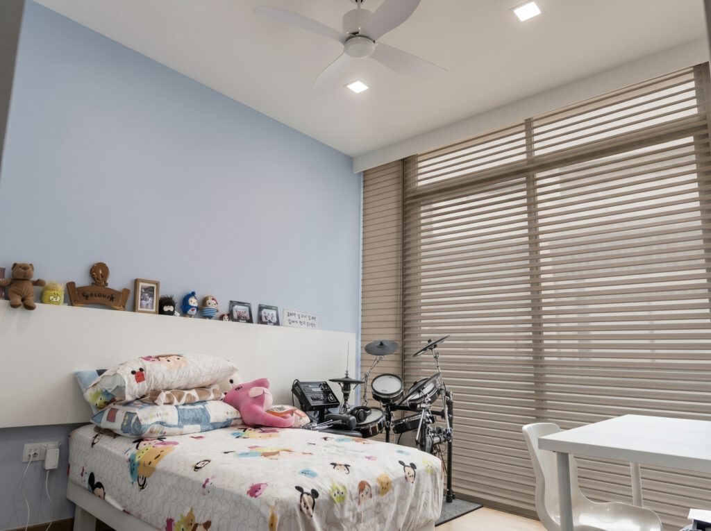 Trishade blinds in a Punggol Waterway View bedroom offering dimout light control for comfort.