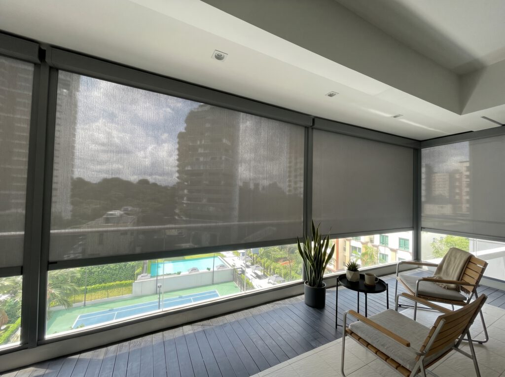 ZipScreen installed on a corner balcony at Parc Clematis condo in Singapore.