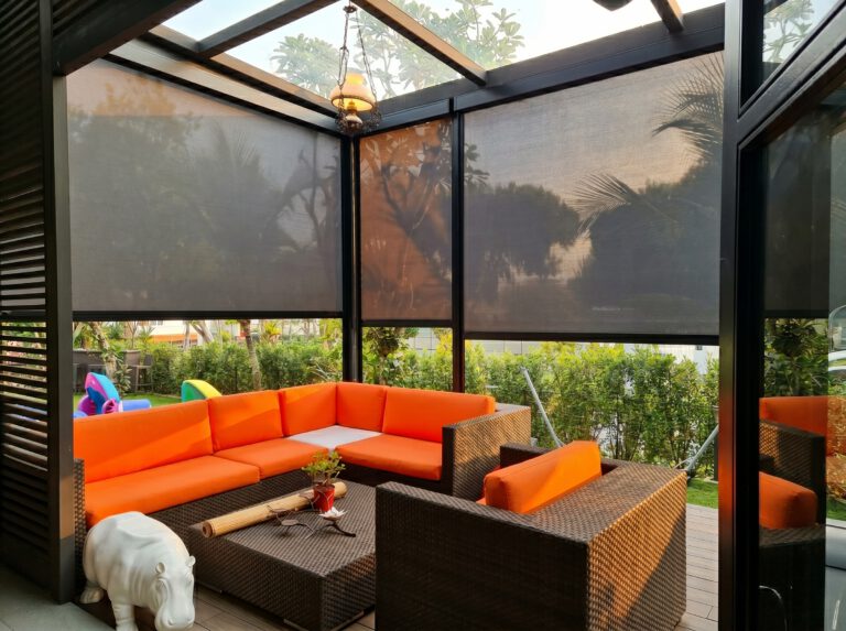 ZipScreen outdoor zip blind fully sealed on a Singapore balcony, wind and rain resistant