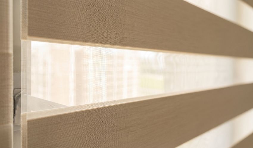 Close-up of Korean blinds fabric used in Bishan homes, showing alternating sheer and opaque stripes
