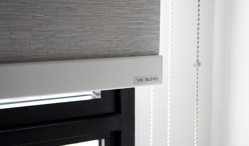 Close-up of a premium roller blind system installed inside a Singapore home.