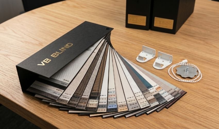 Fabric swatches and hardware samples for a blinds quality check in Ubi