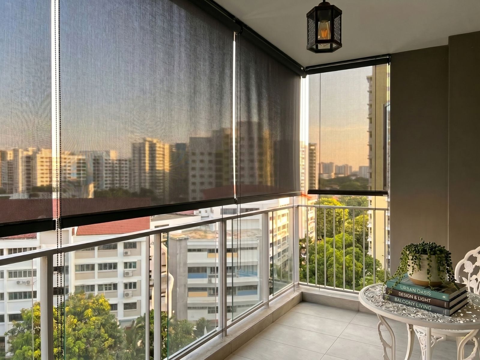 Outdoor blinds installed on a condo balcony to reduce heat, glare and afternoon sun.