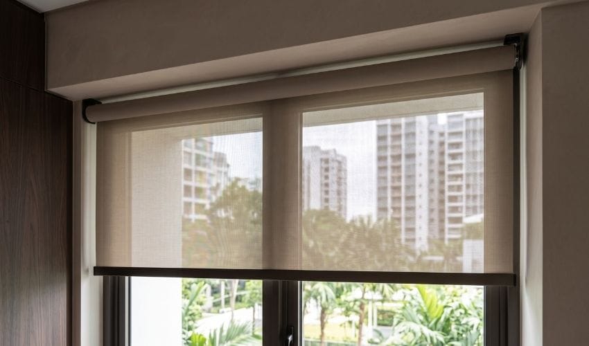 Custom fit roller blinds installed at a Singapore condo window