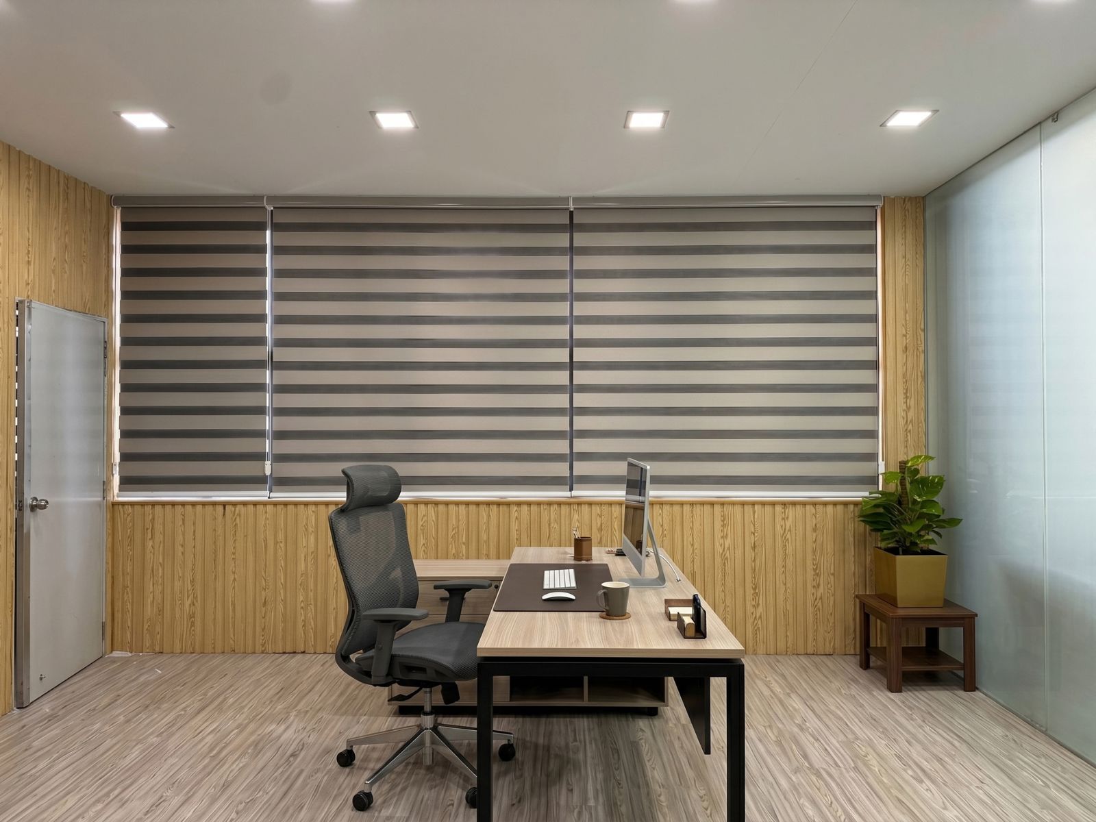 Commercial Korean blinds installation in Jurong East office space featuring modern shadow blinds and glare control.