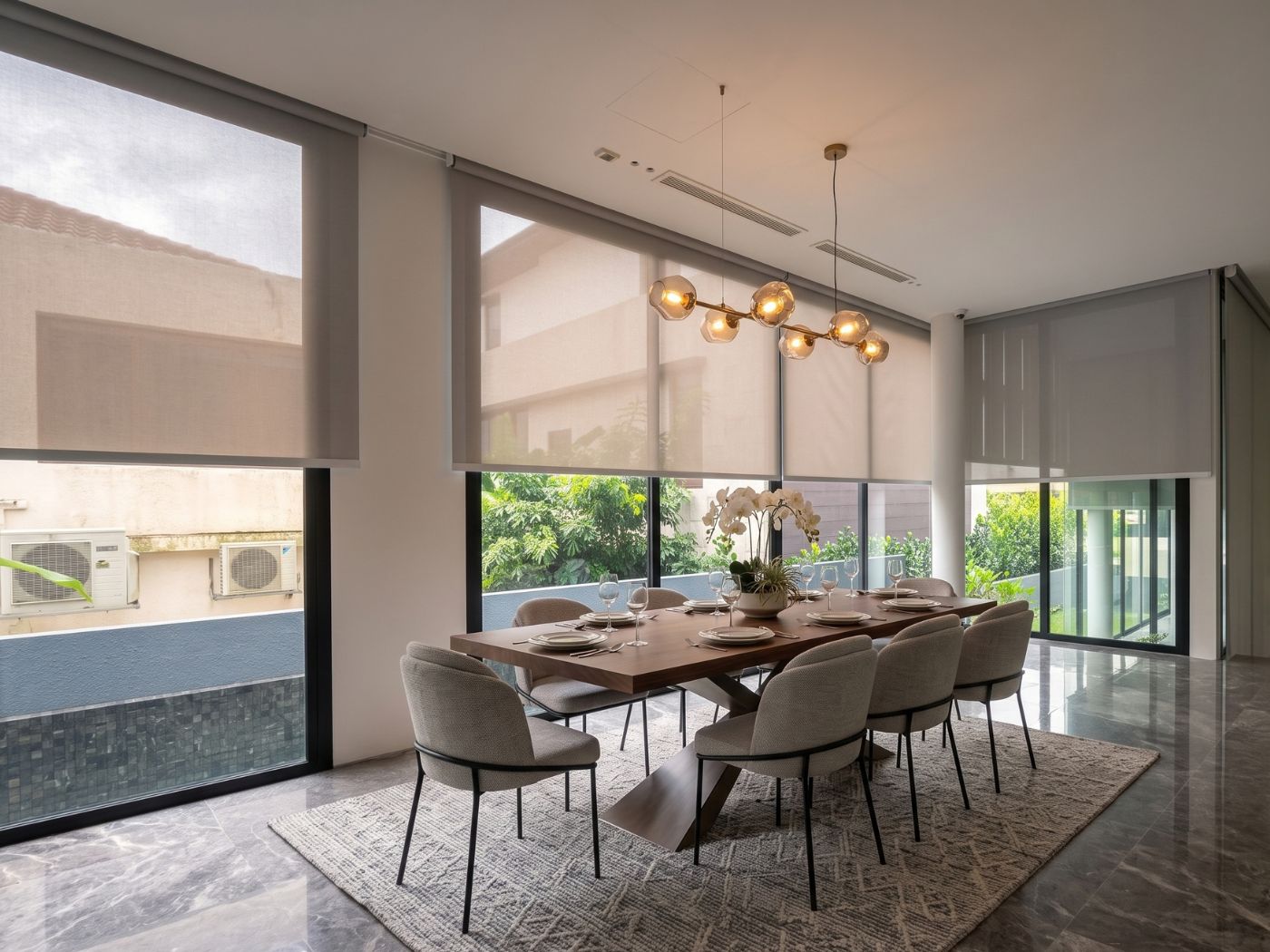 VB Blind sunscreen roller blinds for light control in a Singapore home dining room
