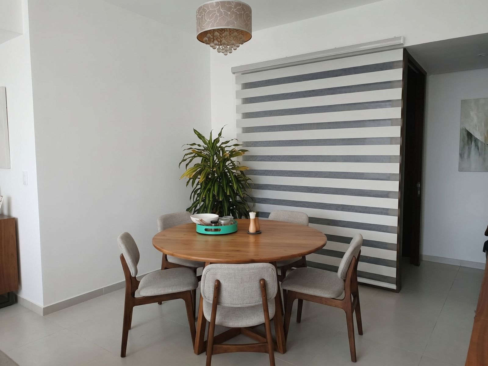 Zebra blinds Singapore installation in a Punggol HDB dining area with modern double layer fabric design.